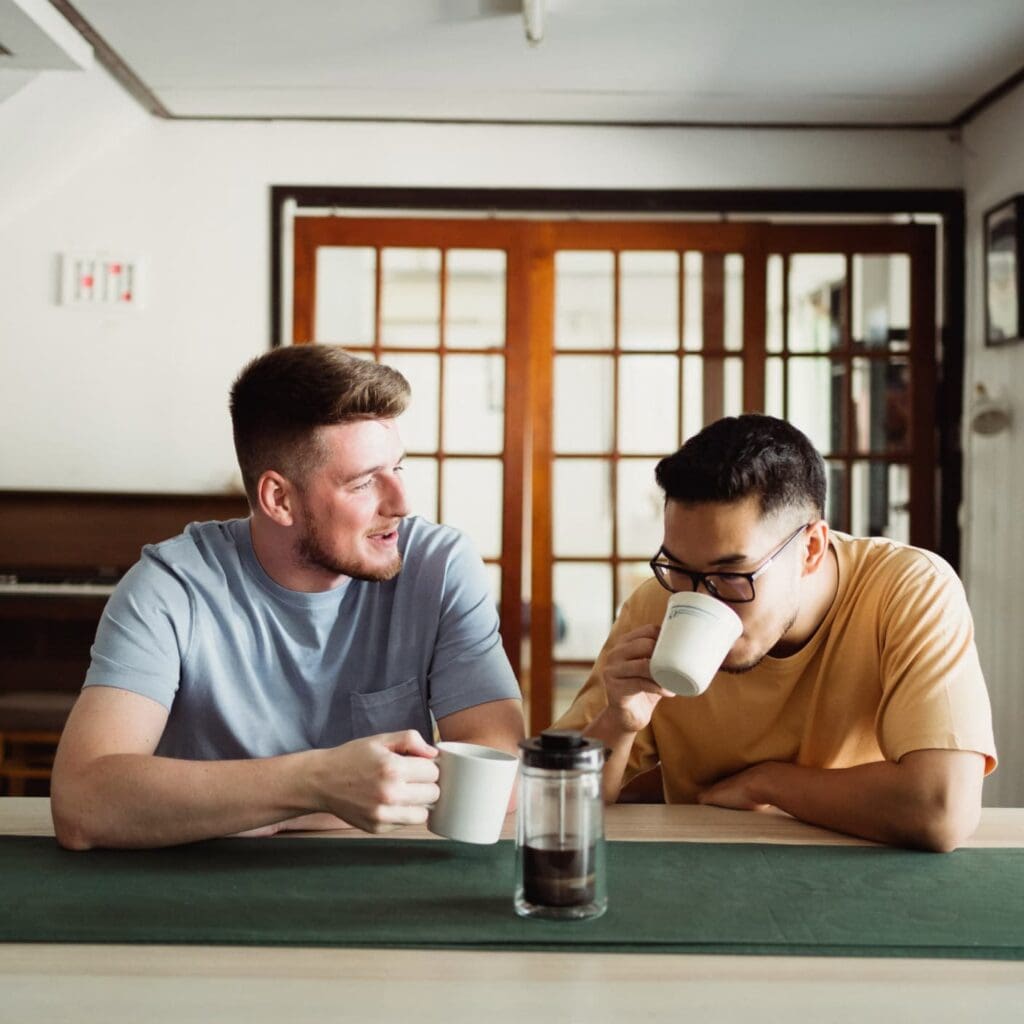 men discussion over coffee